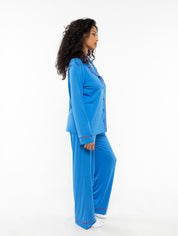 Satya is wearing size S