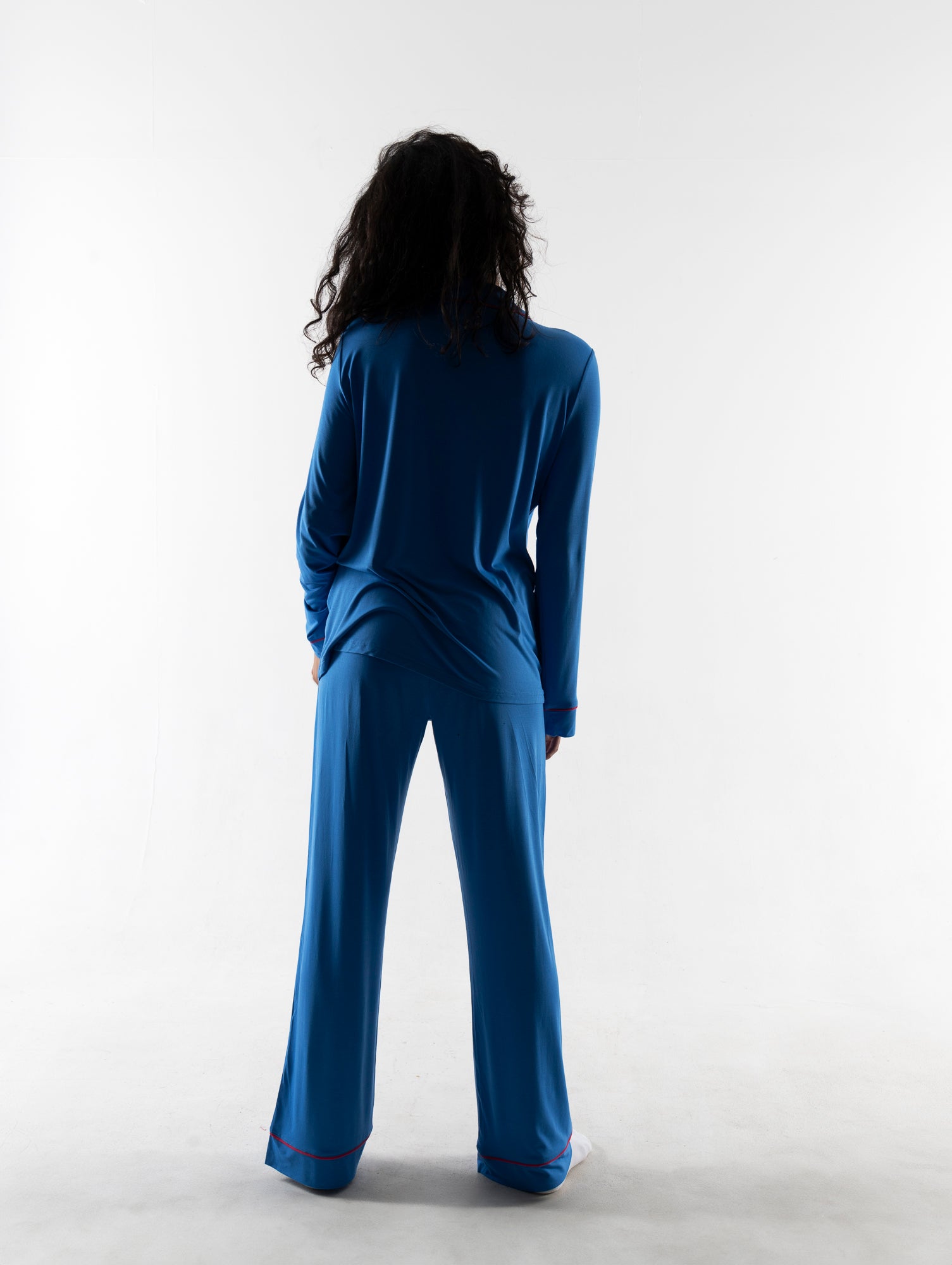 Satya is wearing size S